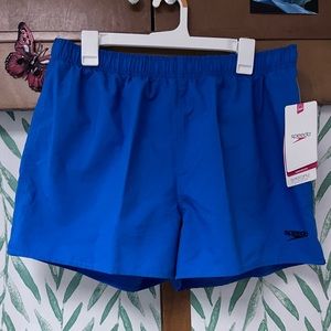 New With Tags. Speedo Blue Waterhorts. Unisex style (Women’s L, Men’s S/M).